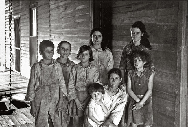 Walker Evans’s image of the Frank Tengle Family, an Alabama sharecropper family from the book “Let Us Now Praise Famous Men”, circa 1936. Photo Courtesy of the New York Times